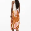 Asymetrická sukně s květinovými motivy Asymetrická sukně s květinovými motivy