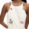 Vyšívané šaty s halter výstřihem Vyšívané šaty s halter výstřihem