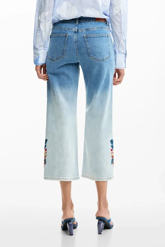 Vyšívané džíny typu culotte Vyšívané džíny typu culotte