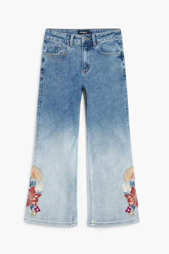 Vyšívané džíny typu culotte Vyšívané džíny typu culotte